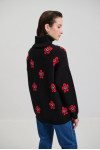 RED TURTLENECK WITH FLOWERS 