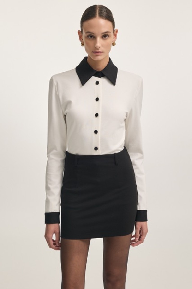 DEADLINE MINI SKIRT 